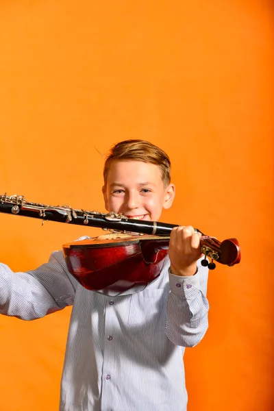 Boy Holds Dombra Clarinet — Stock Photo, Image