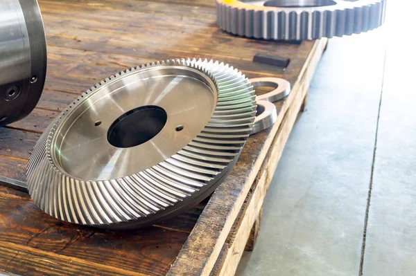 New bevel gear on the shelf after production