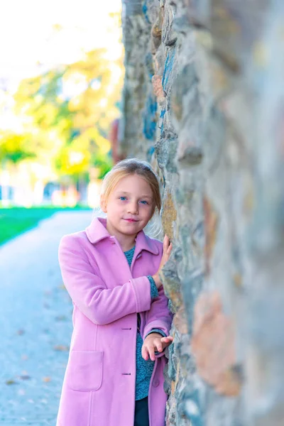 Young Girl Pink Coat Leaning Wall Rubbing Close — Stock Photo, Image