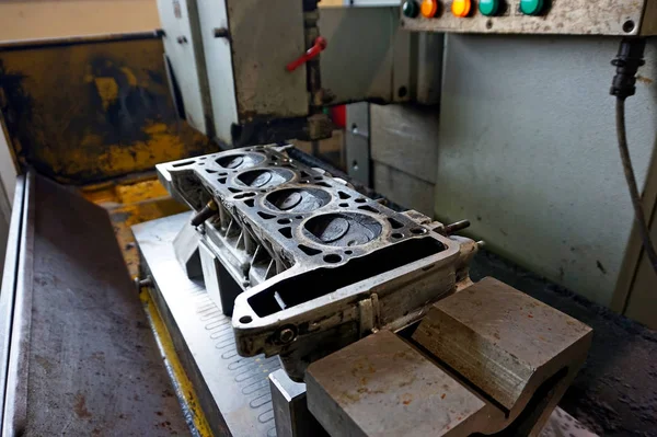 Grinding car head block on the machine. Clean and flat surface.