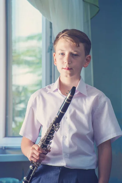 Boy Clarinet Plays Music Window — Stock Photo, Image