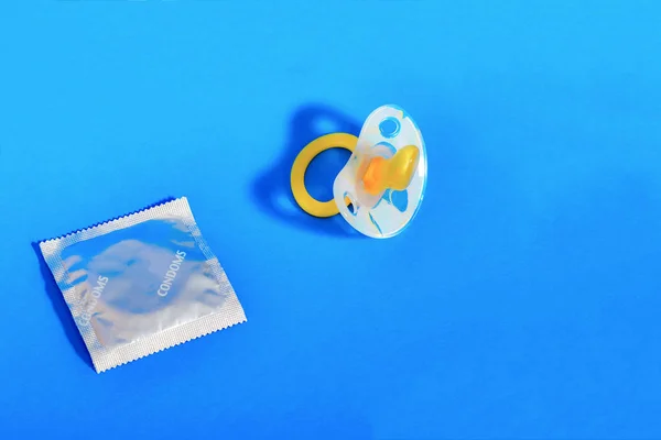 Crossed Out Condom Pacifier Concept Healthy Child Birth Contraception — Stock Photo, Image