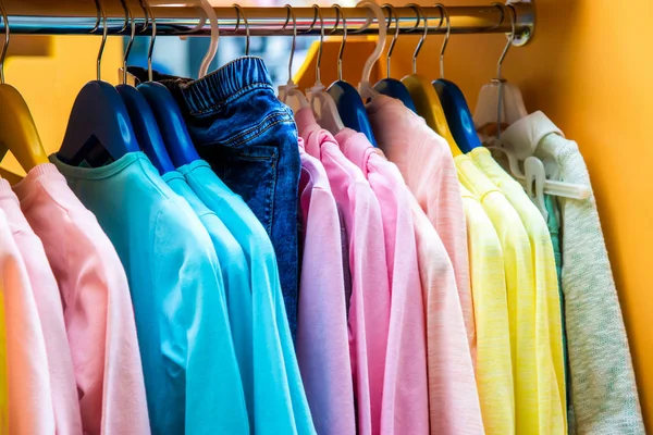 Clothes hanging on a hanger in the store. — Stock Photo, Image