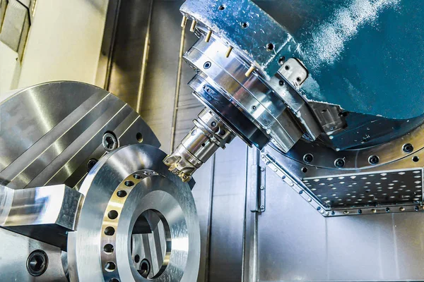 CNC machining center produces machining of parts in production.