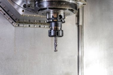 Cnc makinesinde kollet delinme, yakın çekim mühendislik üretimi.