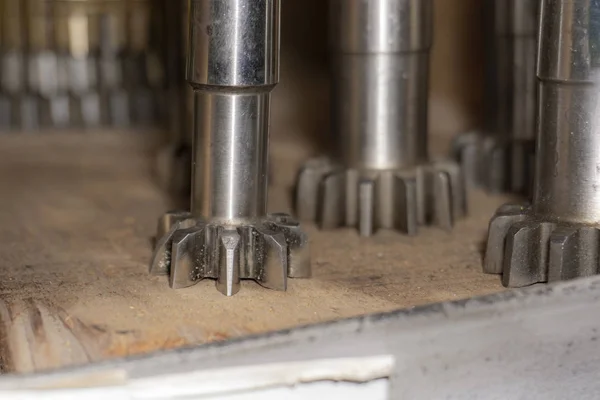 Gear cutting tool in a warehouse in a workshop, a worm cutter for gear processing on a gear cutting machine.