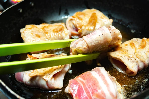 Hostess Turns Fried Rolls Bacon Pan Cooking Junk Fatty Foods — Stock Photo, Image