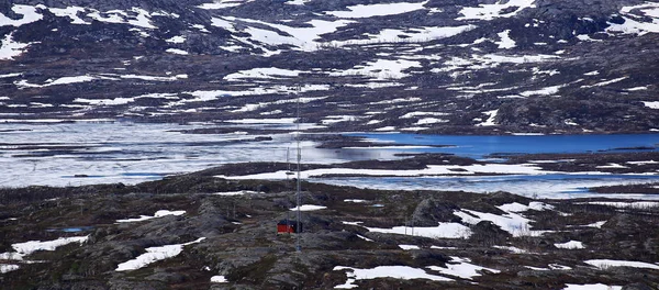 Half frozen lake Vassijaure in June, in Northern Sweden