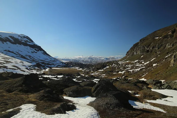 Snow patches and rocks at the valley Karkevagge in Northern Sweden — Stock Photo, Image