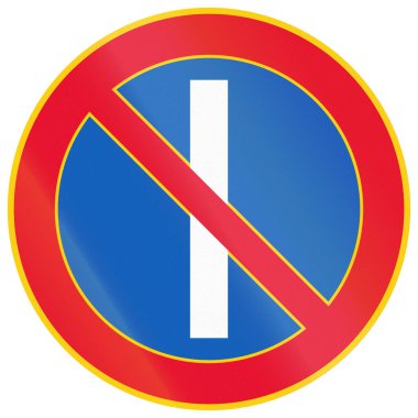 Regulatory road sign in Finland - No parking on odd-numbered days.