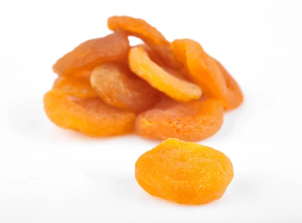 Αποξηραμένο Βερίκοκο Συστατικό Κλείνω Απομονωθεί Λευκό Φόντο Ένα Πορτοκαλί Φρούτα — Φωτογραφία Αρχείου