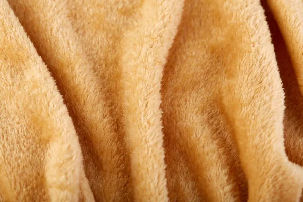 Texture of brown fluffy soft plush. Towel terry cloth, Soft texture cloth