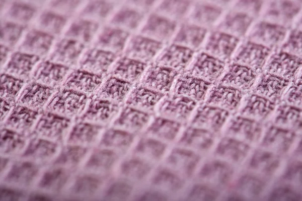 purple fabric with drops of water