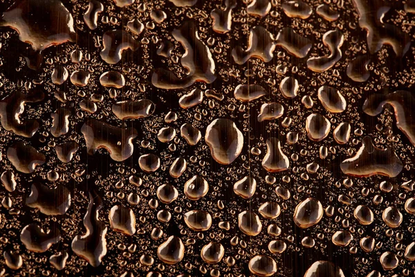 Gekleurde Waterdruppels Een Gouden Achtergrond Abstracte Liquid Sprays — Stockfoto