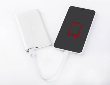 Mobil cihazları şarj etmek için güç banka. Beyaz akıllı telefon şarj cihazı gücü Bankası ile. pil banka. Mobil cihazlar için harici pil.