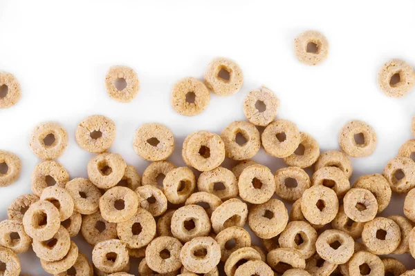 healthy cereal rings on white background. Good morning. A healthy, healthy breakfast. Dry muesli.