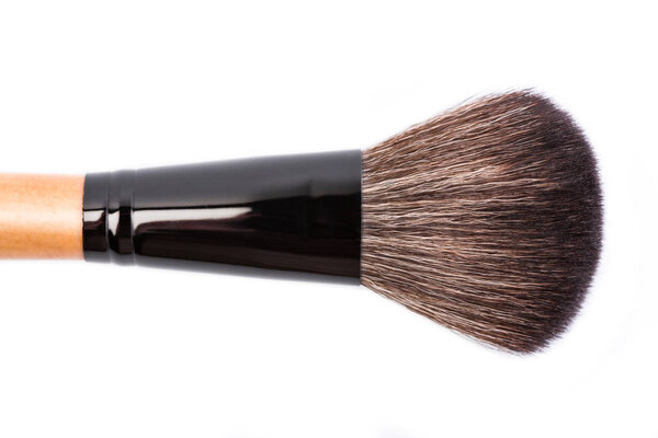 Various makeup brushes isolated over white. wooden makeup brushes. Duo fibre foundation makeup brush. Style. Fashion. Visage. Cosmetics.