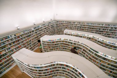 SINGAPORE - JULY 22, 2018. The curved shelves library at Library at orchard in Singapore city.
