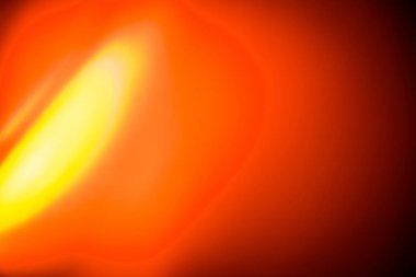 Soyut kırmızı turuncu bulanık ışık arkaplanı. Bulanık hareket gradyan karışık renk arkaplanı. Yaratıcı tasarım, pazarlama malzemeleri, teknolojik görseller ve modern grafik sanat projelerinde kullanım için ideal