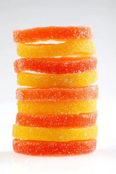 사탕이요 바탕에 마멀레이드 마멀레이드 오렌지 넣는다 사탕의 노란색과 주황색 — 스톡 사진