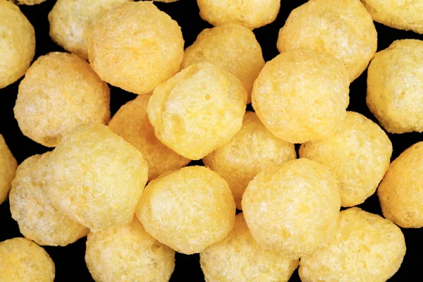 Cheese Balls Snack Isolated Black Background Pile Cheese Flavored Crunchy — Stock Photo, Image