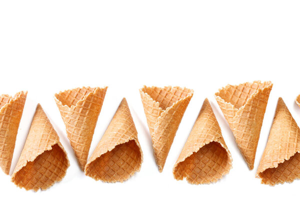 Empty wafer cone cups for ice cream isolated on white background.