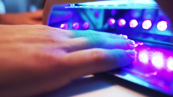 Manicure with led lamp in process — Stock Video