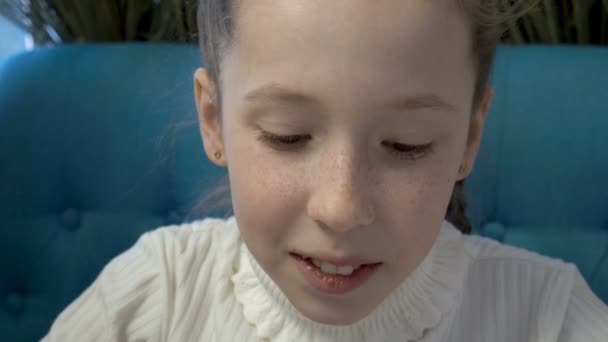 Child Face Close Little Girl Freckles Her Face Looking Camera — Stock Video