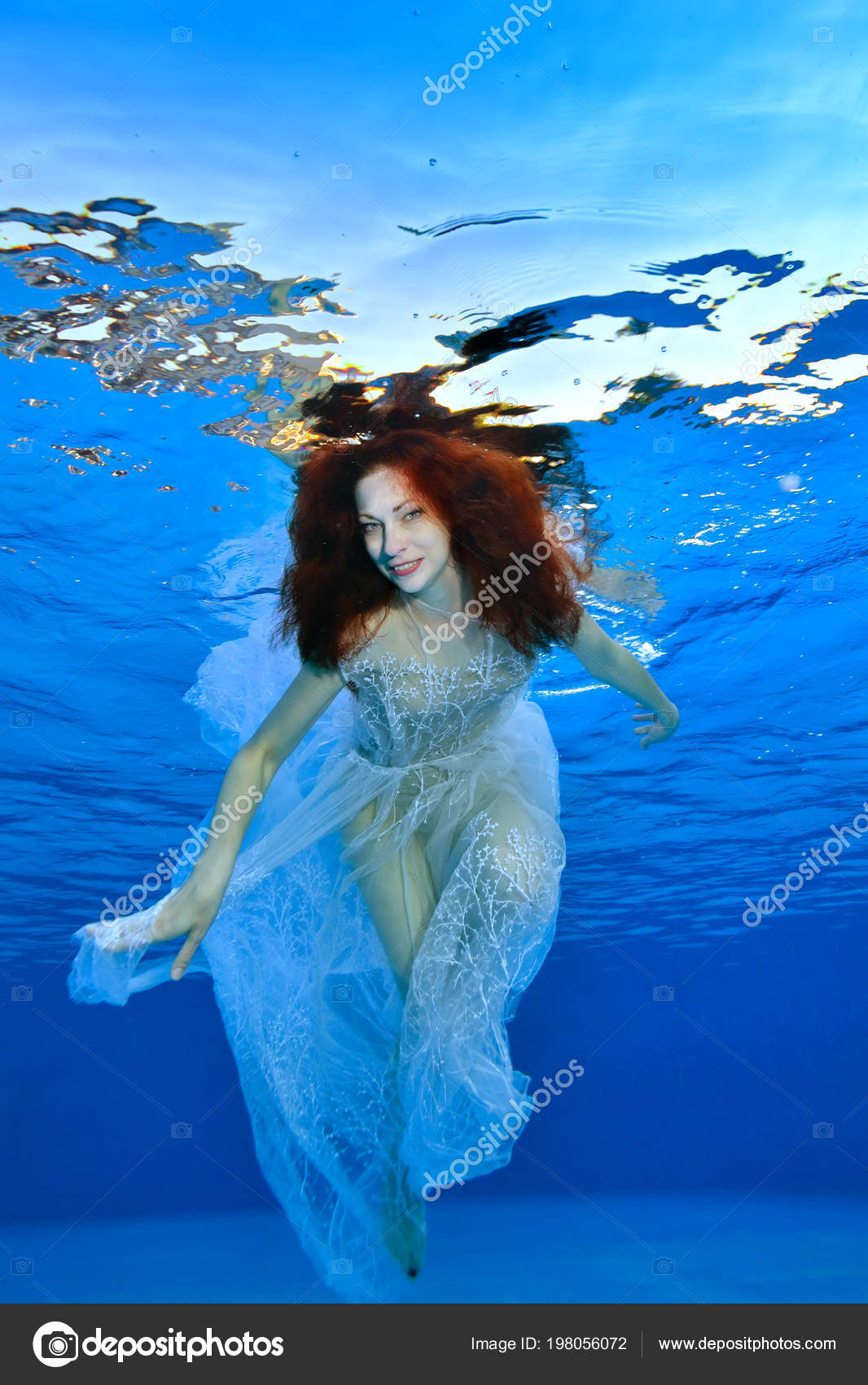 swimming in dress