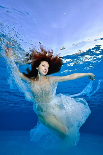 Bride White Dress Fluttering Red Hair Dancing Underwater Blue Background — Stock Photo, Image