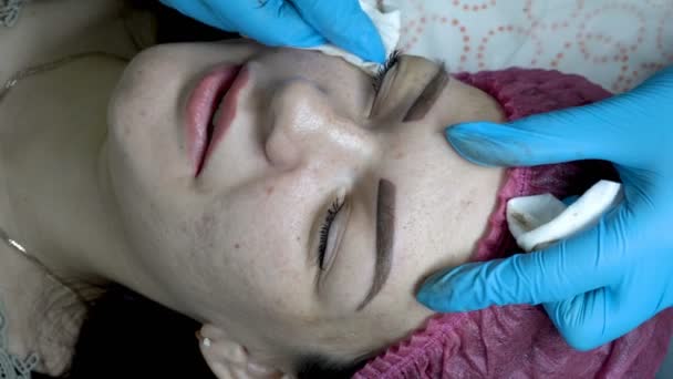 Beautician Treats Skin Eyebrows Girl Beauty Salon Procedure Permanent Makeup — Stock Video