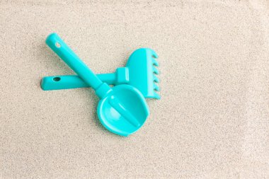 Çılgın ve kürekle kum, arka plan.