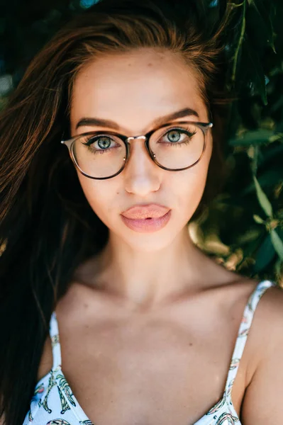 portrait of beautiful young woman with big lips