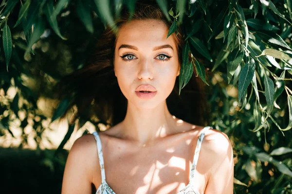 portrait of beautiful young woman with big lips