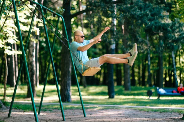 Adult Man Swinging Swing Playground Summer Park — Stock Photo, Image