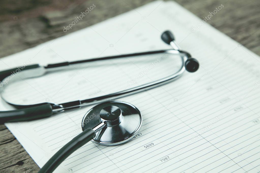 stethoscope and document on the table