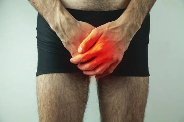 Man having a problem with his penis — Stock Image Man having a problem with his penis Royalty Free Stock Photos