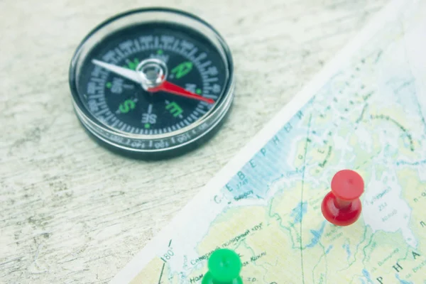 Compass and map on the table Stock Picture