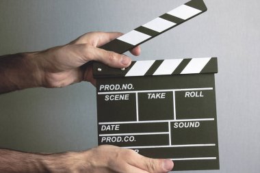 Film clapper ve genç adam