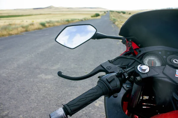 Red sport bike stands on the track — Stockfoto