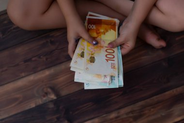 El çocuk kavramı Yatırım Emlak finans para. İsrail Şekeli