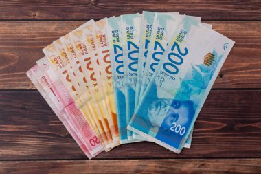 Yeni İsrail Şekeli banknotlar yeni 200, 100, 20, 50 Şekeli. Şikel duvar kağıdı üst görünüm faturaları. Siyaset ve para İsrail arka plan.