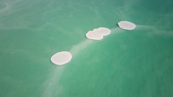 Salt crystals on the surface of Dead sea, Israel