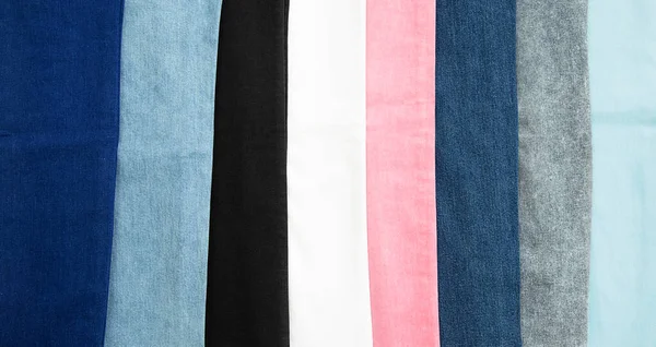 Kotlar 6 farklı renk, arka plan kıyafet, kot pantolon — Stok fotoğraf