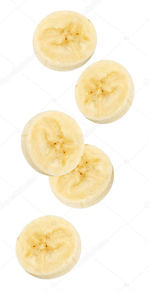 Isolated flying banana. Peeled falling banana slices isolated on white, with clipping path