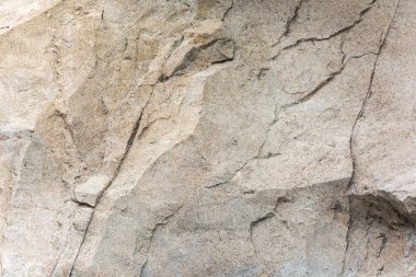 Taş arka plan. Kaba tekstürlü taş duvar. Taş malzeme dokulu yüzeyi.