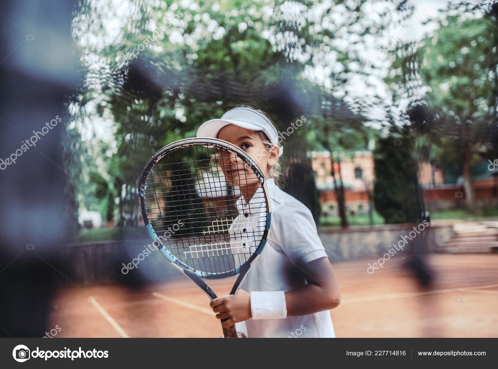 Foto de Tiro De Vista Traseira Da Linda Menina Jogador