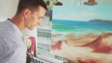 Erkek ressam boyalar manzara tuval üzerine