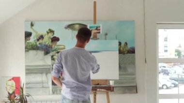 adam ressam boya tuval üzerine resim