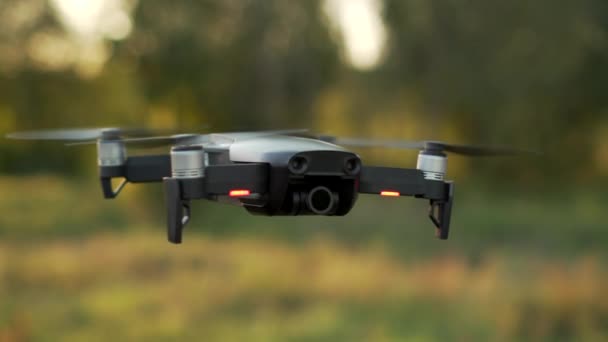 Drone hovering in air close up — Stock Video